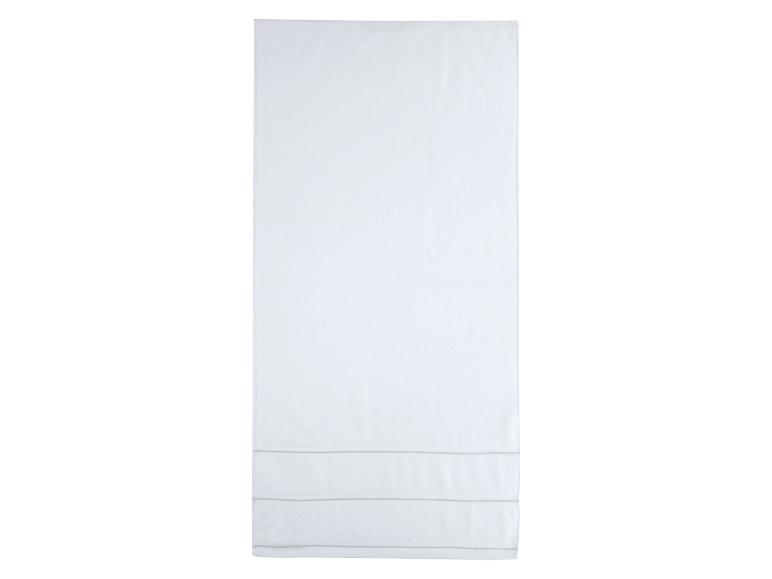 Witte handdoek met grijze decoratieve strepen