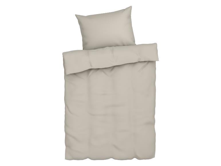 Een lichtbeige beddengoedset.