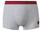 Grijze boxershorts met rood elastiek en een hartje.