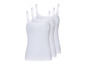 Drie witte tanktops met spaghettibandjes.
