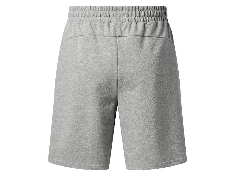 Grijze sportshorts met elastische tailleband, achterkant.