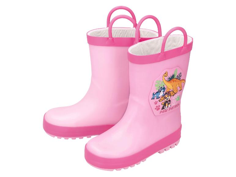 Roze kinderregenlaarzen met stripfiguren en dinosaurussen.