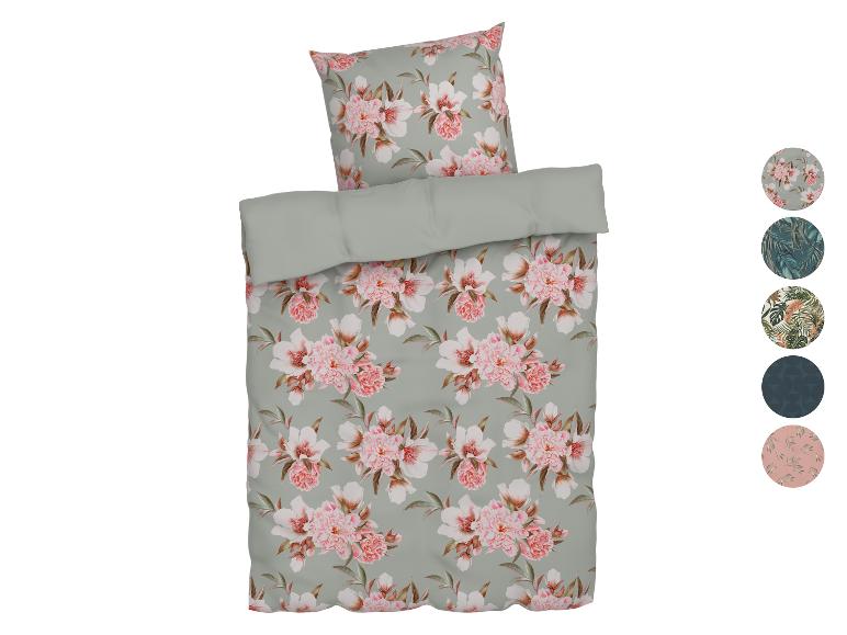 Bloemen beddengoed in zachte kleuren.