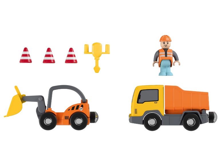 Bouw speelgoedset met een graafmachine, een kipper, een werkerfiguur en andere accessoires.