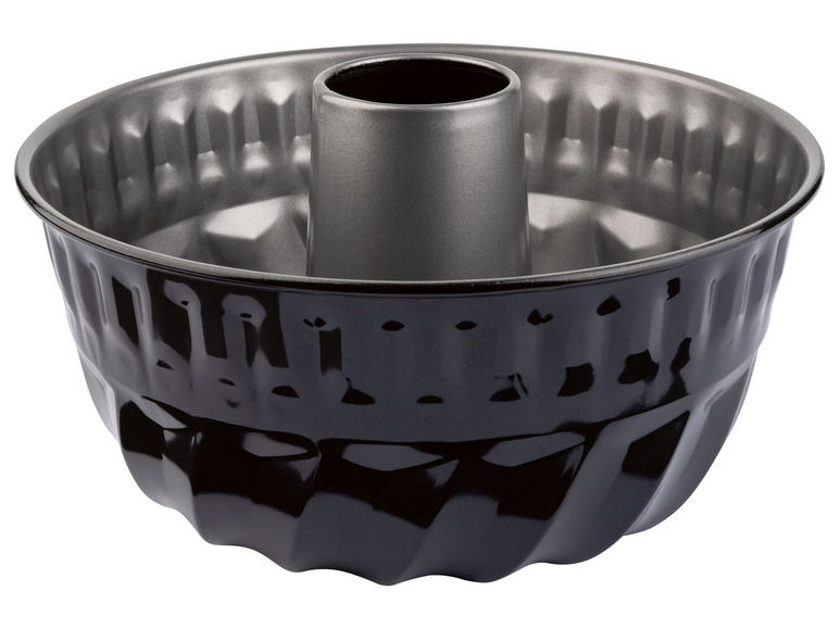 Een zwarte tulbandvorm met een gat in het midden.