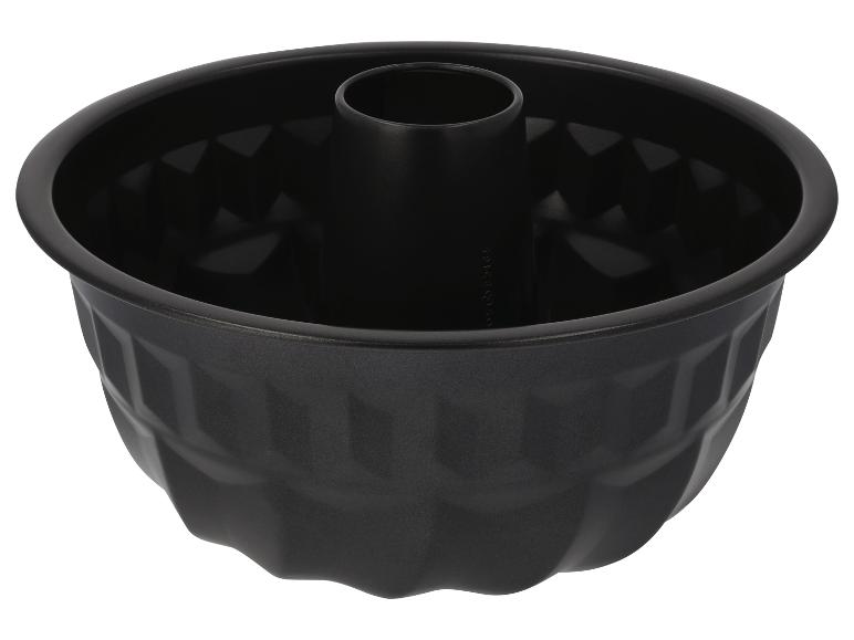 Zwarte tulbandvorm met geribbeld ontwerp en centrale buis.