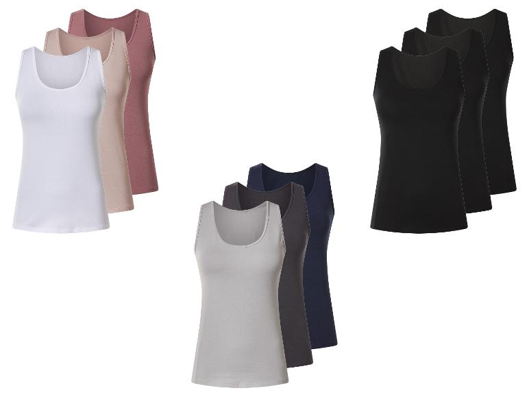 Set van drie dameshemdjes in wit, beige en roze, en drie in zwart, grijs en marineblauw.