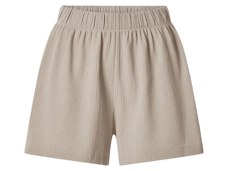 Beige shorts met elastische taille en gekreukelde textuur.