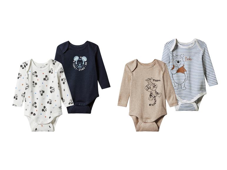Vier rompertjes met lange mouwen voor baby's met Disney Mickey Mouse en Winnie de Poeh-prints.