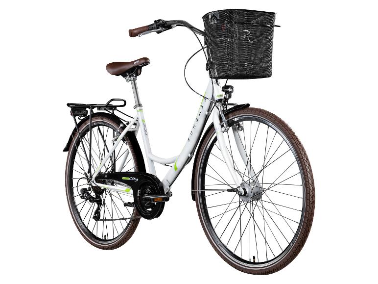 Een witte Zündapp Z 700 City fiets met bruine accenten en een zwarte mand.