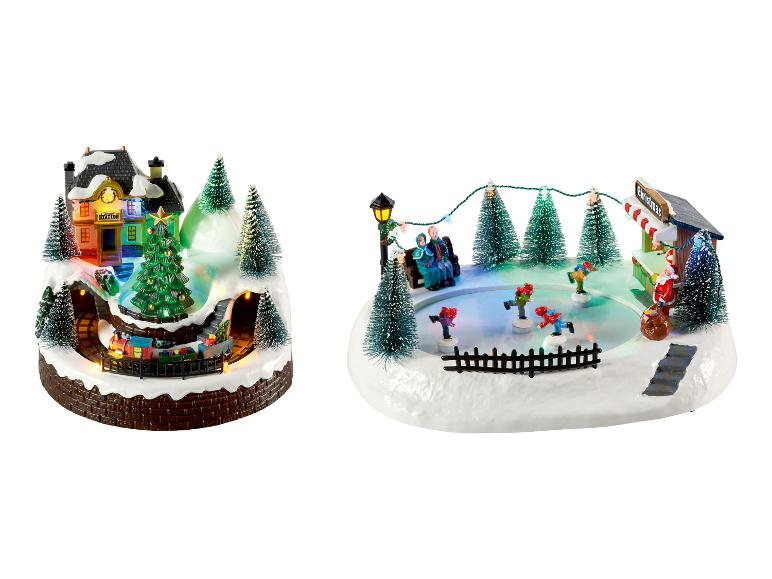 LIVARNO® LED-kerstdorp met trein en schaatsers, muziek en beweging.