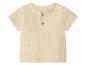 Beige kinderoverhemd met korte mouwen en knopen