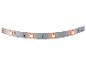 Witte LED-strip met oranje lampjes aan