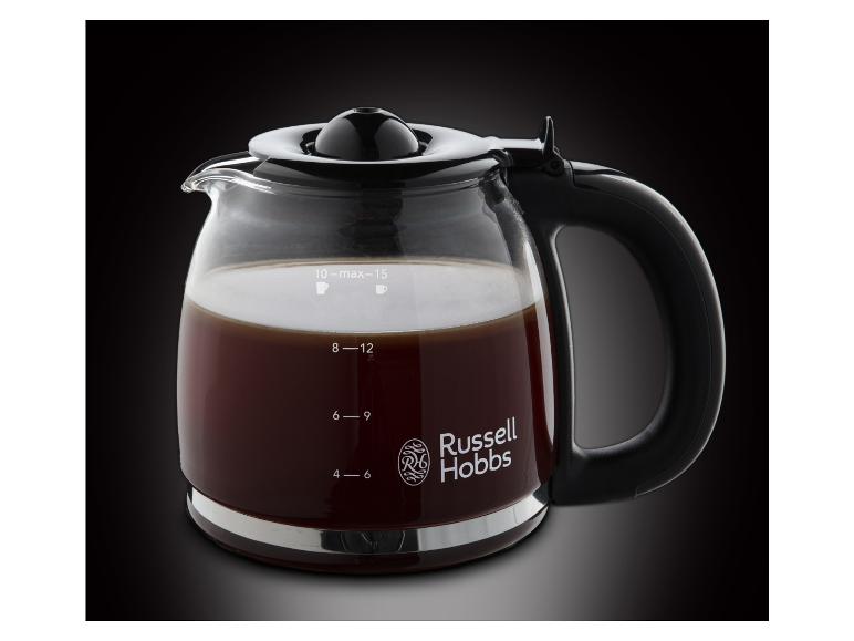 Een glazen koffiekan met een zwarte handgreep, gevuld met koffie, van Russell Hobbs.