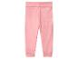 Roze babybroek met brede, omvouwbare tailleband en geribde boorden.
