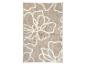 Beige vloerkleed met bloemenpatroon.
