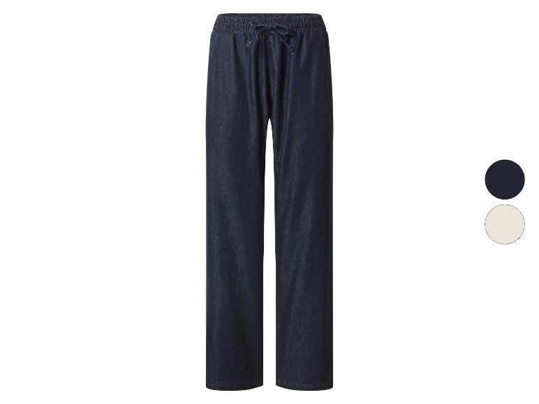 Donkerblauwe denim broek met elastische tailleband en trekkoord, getoond met kleurstalen.
