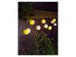Solar string lights met gele en witte papieren lampionnen.