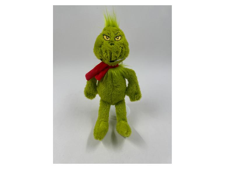 Groene Grinch knuffel met rode sjaal en microfoon