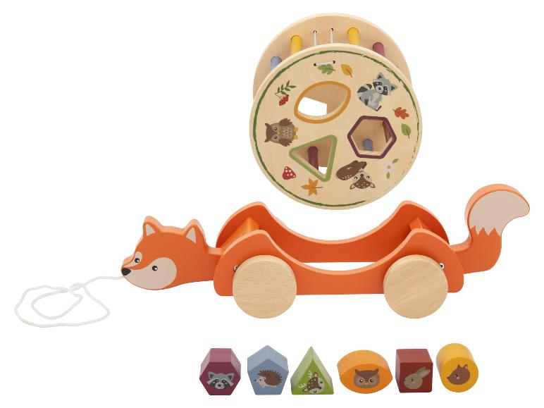 Houten vossen speeltje op wielen met vormsorteerder en dierenblokken.