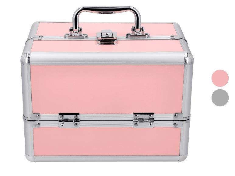 Roze make-upkoffer met zilverkleurige details en sluitingen