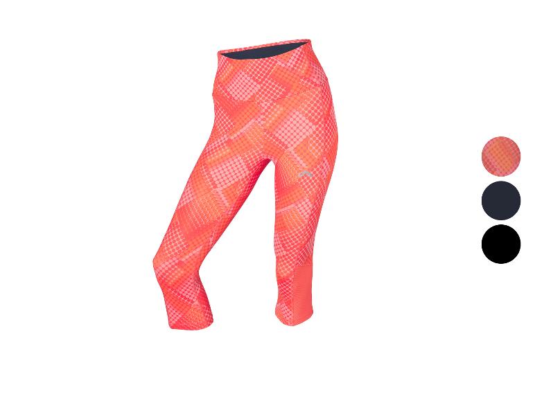 Dames sportlegging met stippenpatroon in oranje en roze