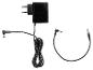 Zwarte stroomadapter met DC-stekker en audiokabel met 3,5 mm jackplug