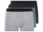Drie boxershorts in grijs, groen en zwart.