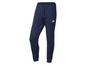 Blauwe Adidas joggingbroek met wit logo.