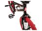 Zwarte BMX-fiets met rode banden en Tektro-remmen.