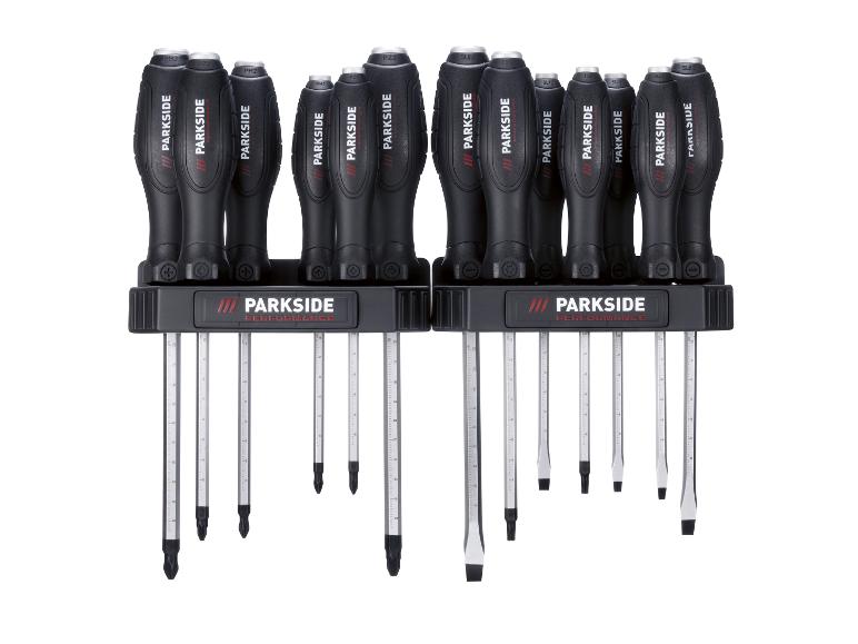 Schroevendraaierset met diverse Phillips-, Pozidriv-, Torx- en platte koppen, in een zwarte houder.