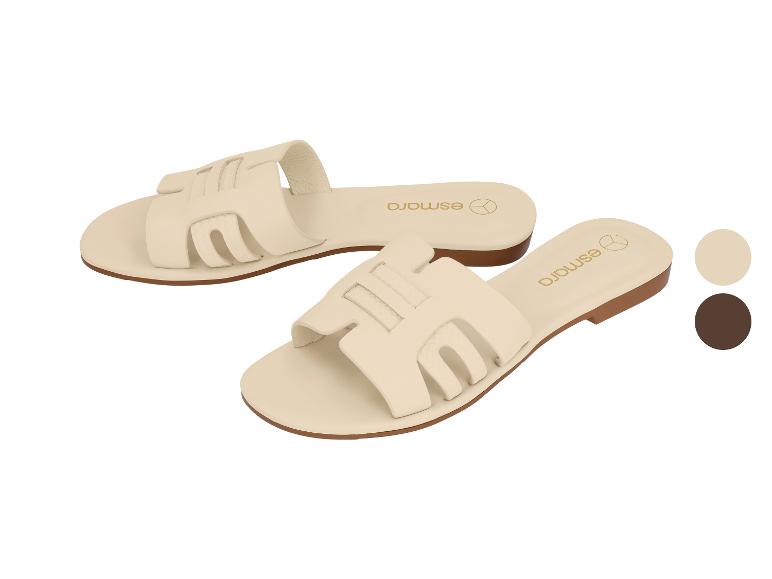 Dames beige platte sandalen met gevlochten bandjes.