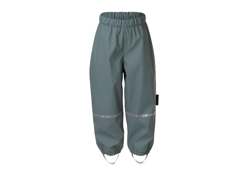 Waterdichte kinderbroek met reflecterende details en elastische enkelbandjes.
