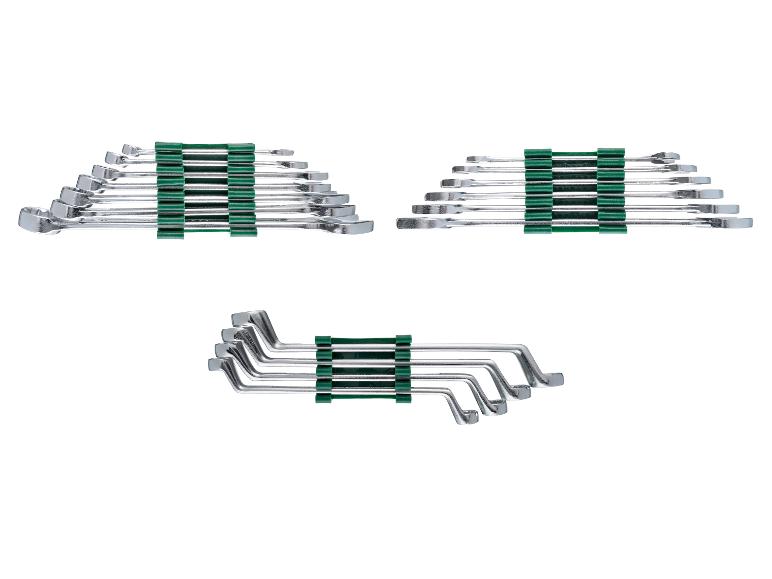 Drie sets zilverkleurige steeksleutels met groene houders.