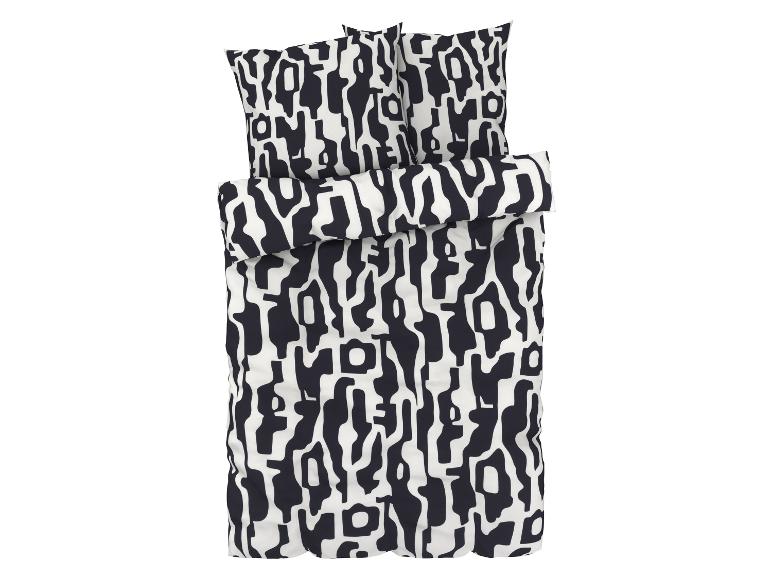 Een dekbedovertrek met kussensloop in zwart-wit met een abstract patroon.