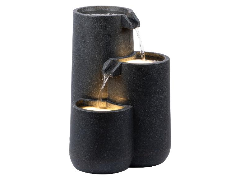 Decoratieve drielaagse donkergrijze granieten waterfontein met LED-verlichting.