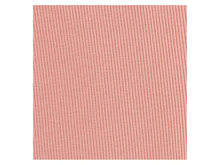 Close-up van roze geribbelde stof.