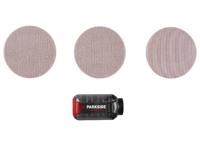 Drie ronde schuurpapieren en een zwart gereedschap met rood detail.