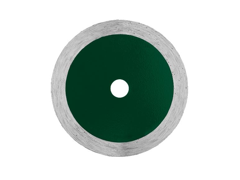 Groene en zilveren doorslijpschijf met een centraal gat, voor elektrisch gereedschap.