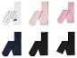 Witte, roze en zwarte tights met verschillende patronen.