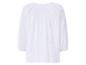 Witte blouse met lange mouwen en geborduurde paisley-patronen, achterkant.