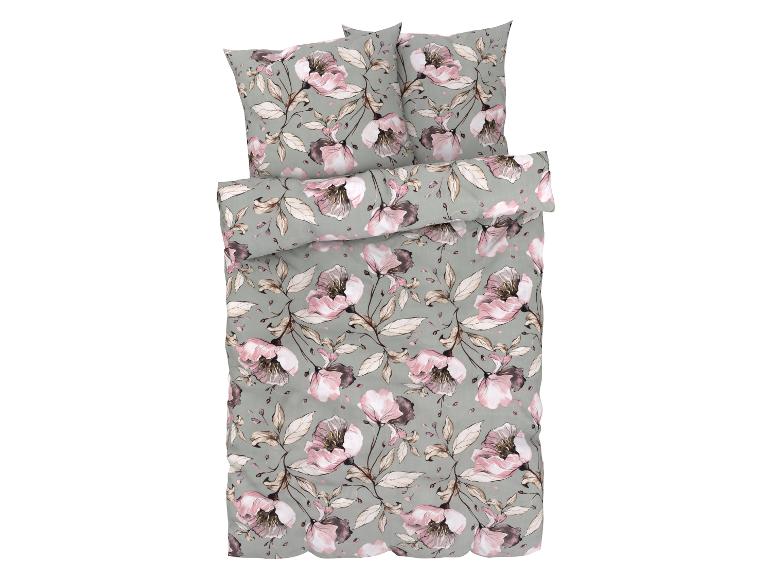 Bloemen beddengoed: dekbedovertrek en kussenslopen met roze en grijze bloemenprint.