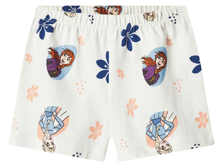 Witte meisjes short met cartoonfiguren en bloemenprint.