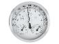 Zilverkleurige analoge barometer, thermometer en hygrometer die druk, temperatuur en vochtigheid weergeven.