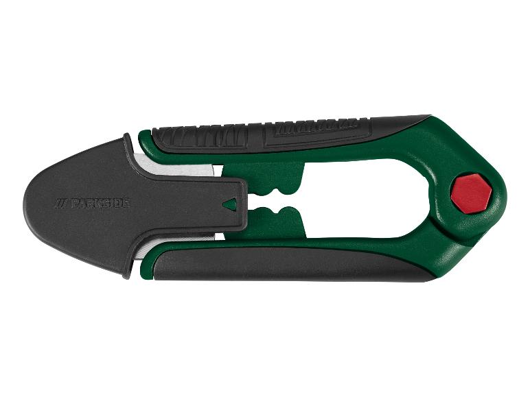 Groen en zwart universeel mes met intrekbaar lemmet en ergonomische handgreep.