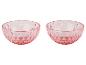Twee roze glazen kommen met facetgeslepen design.