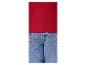 Rode geribbelde top en blauwe jeans