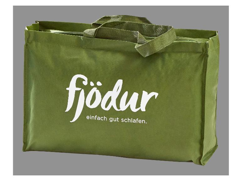 Groene Fjödur-tas met de tekst 'einfach gut schlafen'.