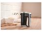 SilverCrest handmixer met deegkom en eieren op een houten aanrecht.