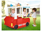 Drie kinderen spelen met een rode speelgoed foodtruck van Feber.